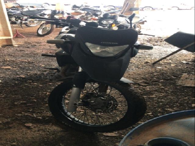 Lote 35 · HONDA/XRE 300 2014 — conservado